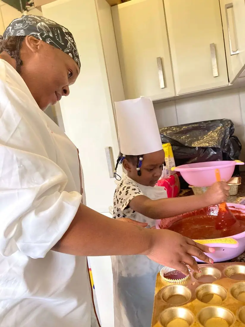 A Little Hearts learner taking part in a baking activity
