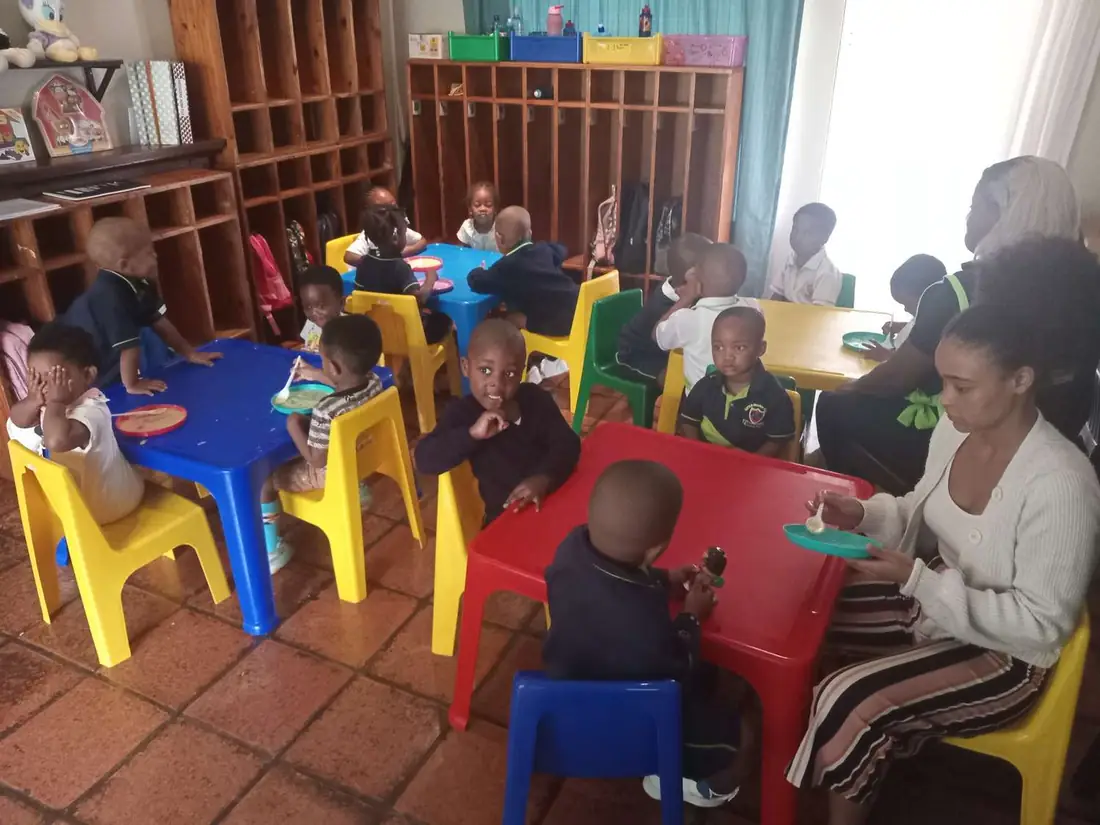 Little Hearts learners eating porridge for breakfast