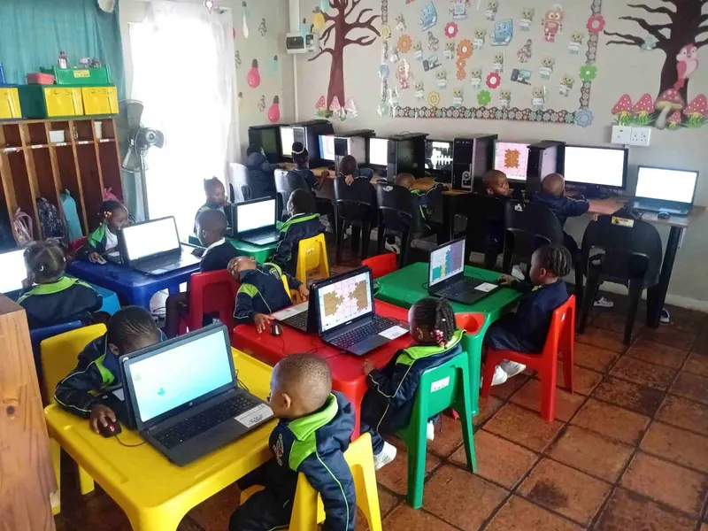 Children taking part in computer lessons