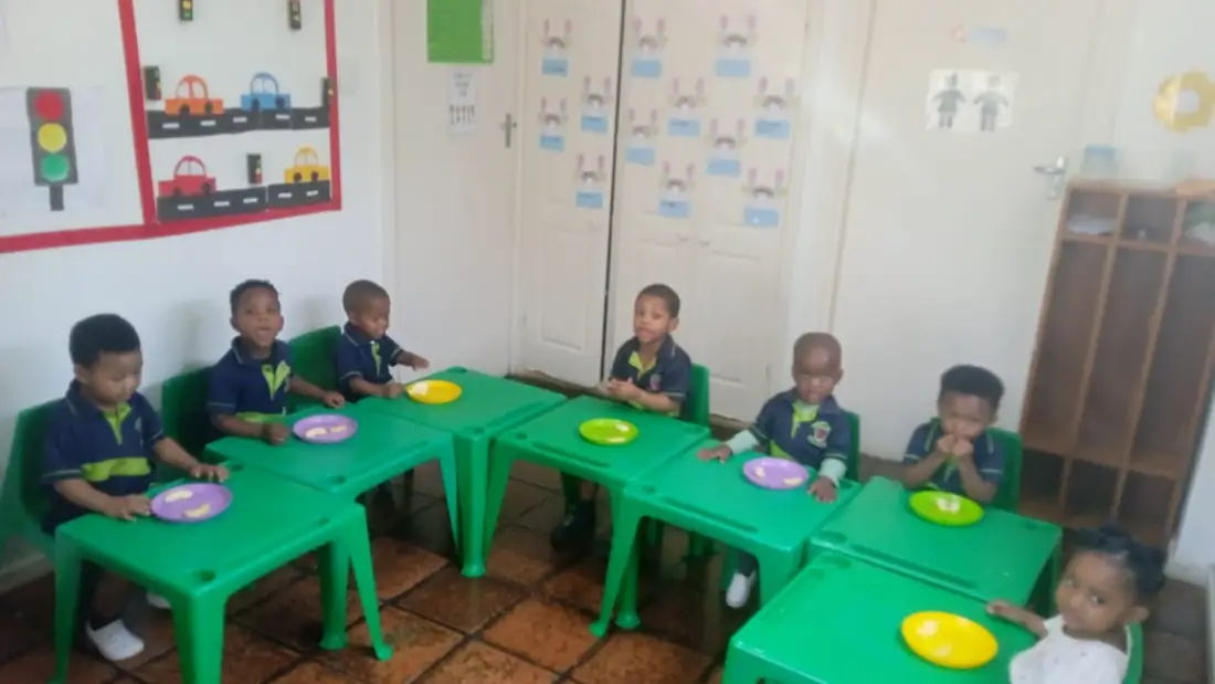 Little Hearts learners sharing a supervised mealtime