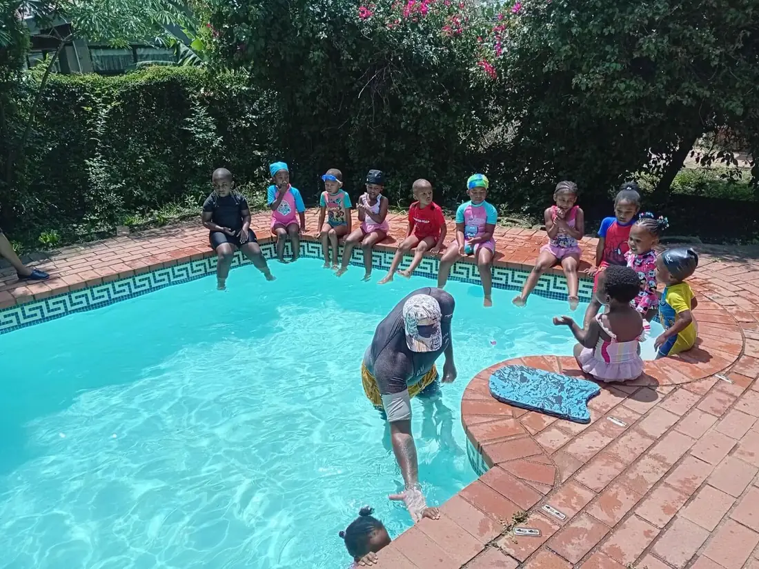 Little Hearts learners developing confidence during a swimming session