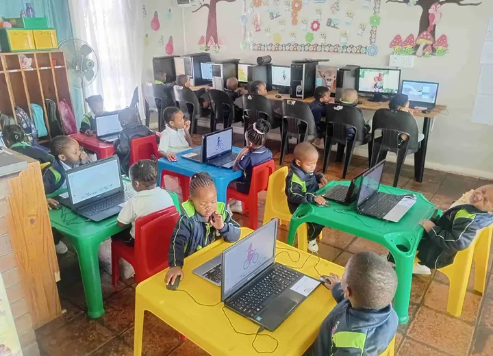 Children taking part in computer lessons