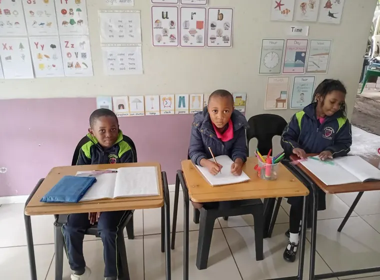 Junior primary learners working in class